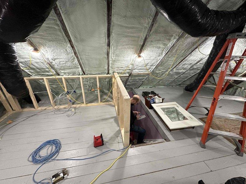 Completed attic ductwork renovation, including installation of new flexible ducts, insulation of ductwork and ceiling space with reflective foil-faced material, and structural framing adjustments to improve system efficiency. Work involved accessing confined attic space, routing ducts through existing frame structure, and ensuring proper airflow configuration.