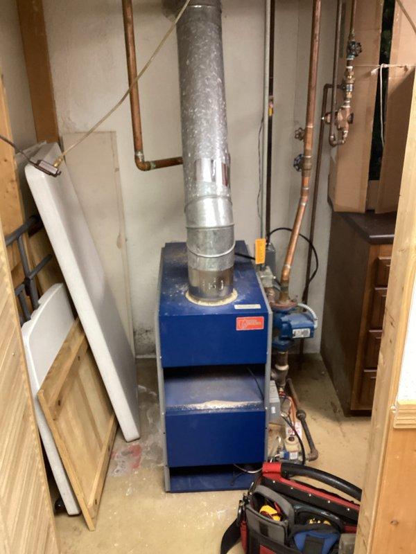 Responded to a no-heat service call for an aging 10+ year Resideo control system. Upon inspection, found failed circulator pump and pressure regulator affecting the boiler's operation. Replaced both components, purged air from system, and confirmed proper pressure readings on gauge. System now functioning correctly with consistent heat distribution throughout the home.