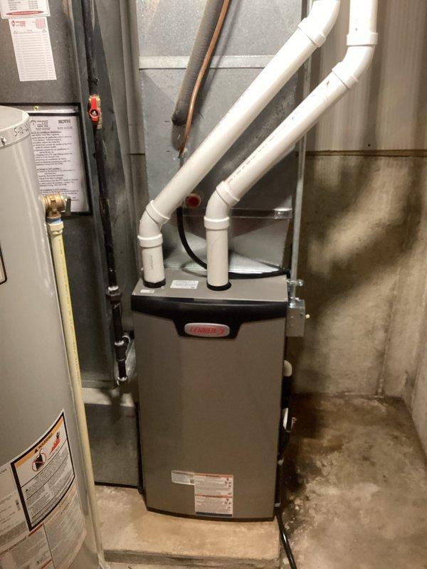 Successfully installed a new Lennox furnace in the utility room, replacing the previous unit. Completed installation of PVC exhaust venting system with appropriate elbow joints for proper ventilation. System was tested and confirmed to be functioning according to manufacturer specifications.