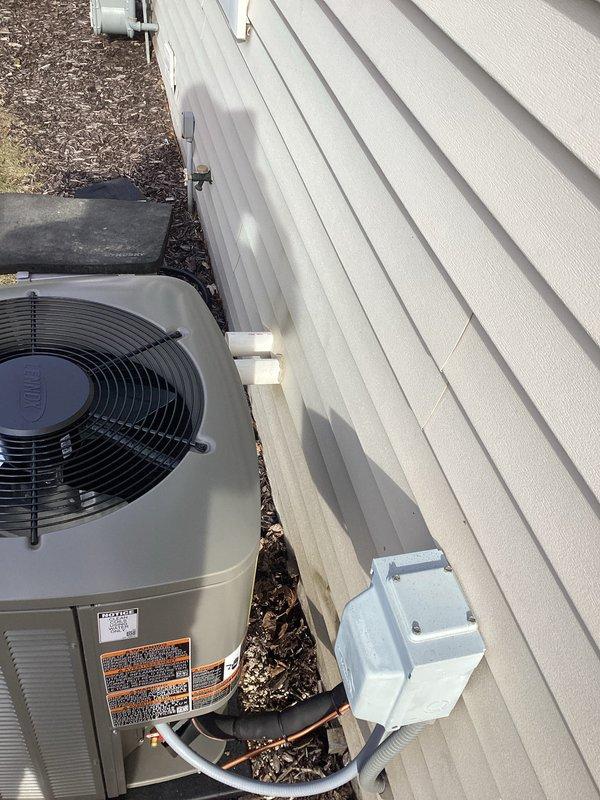 Successfully installed a complete HVAC system, including a new outdoor condensing unit set on a proper foundation pad with mulch landscaping surrounding the equipment. Connected all refrigerant lines, electrical components, and PVC drain piping according to manufacturer specifications, ensuring the system meets all current safety standards and operational requirements.