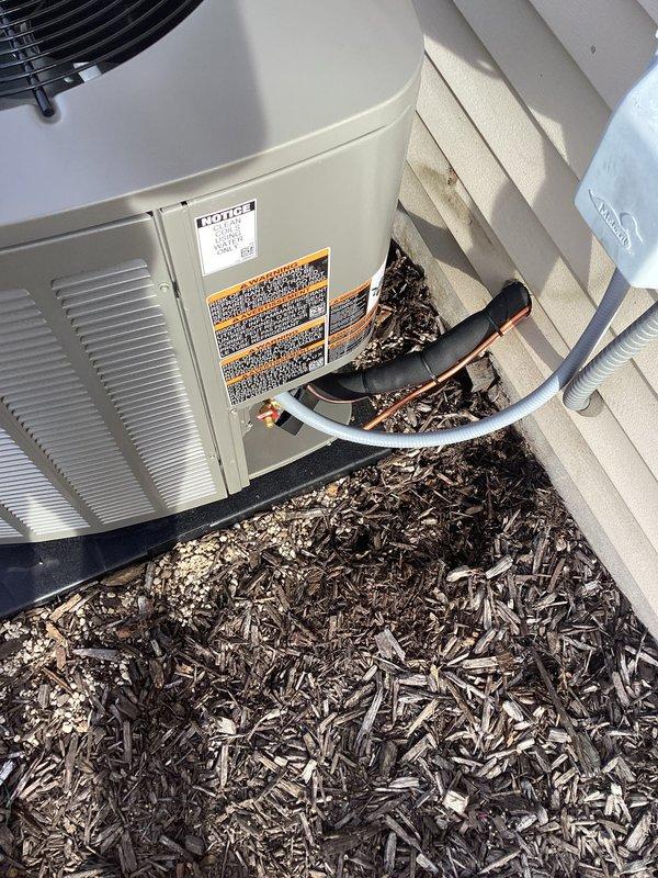 Successfully installed a complete HVAC system, including a new outdoor condensing unit set on a proper foundation pad with mulch landscaping surrounding the equipment. Connected all refrigerant lines, electrical components, and PVC drain piping according to manufacturer specifications, ensuring the system meets all current safety standards and operational requirements.
