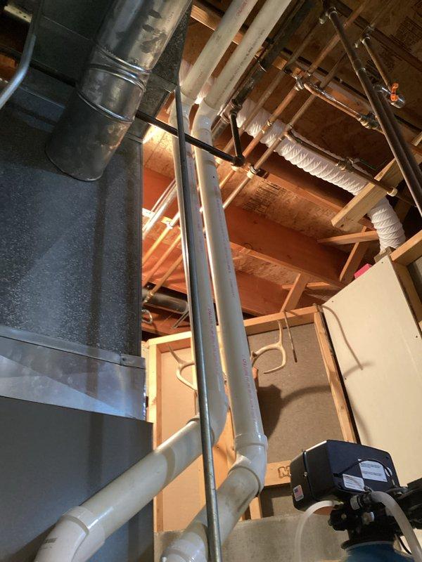 Performed routine maintenance tune-up on Goodman furnace system. Conducted thorough inspection of internal components including motor assembly, wiring connections, and control board - all components found in normal working condition. Examined installation integrity of PVC venting system and checked ductwork throughout utility area, confirming proper airflow and ventilation.