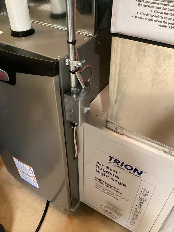 Successfully installed new furnace with accompanying Trion Air Bear Supreme Right Angle filtration system. Properly connected all electrical components through junction box with required conduit. System tested and verified gas pressure reading of 16.5 on MA-line digital manometer, confirming proper operational parameters.