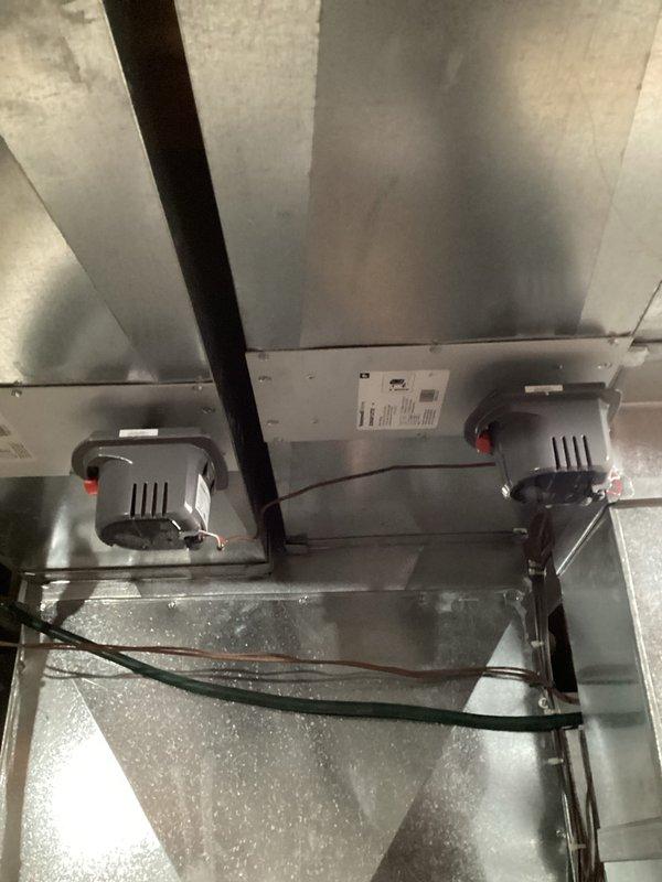 Completed inspection and repair of HVAC system including examination of the ceiling-mounted dual motor/actuator assembly. Located and serviced the RDMZ control module connected to the downstairs zone system. Performed necessary adjustments to the ventilation components and verified proper functioning of all mechanical elements. Ensured all wiring connections were secure and system was operating according to specifications.