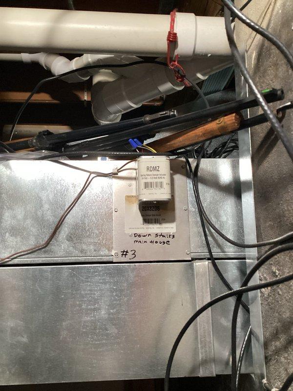 Completed inspection and repair of HVAC system including examination of the ceiling-mounted dual motor/actuator assembly. Located and serviced the RDMZ control module connected to the downstairs zone system. Performed necessary adjustments to the ventilation components and verified proper functioning of all mechanical elements. Ensured all wiring connections were secure and system was operating according to specifications.