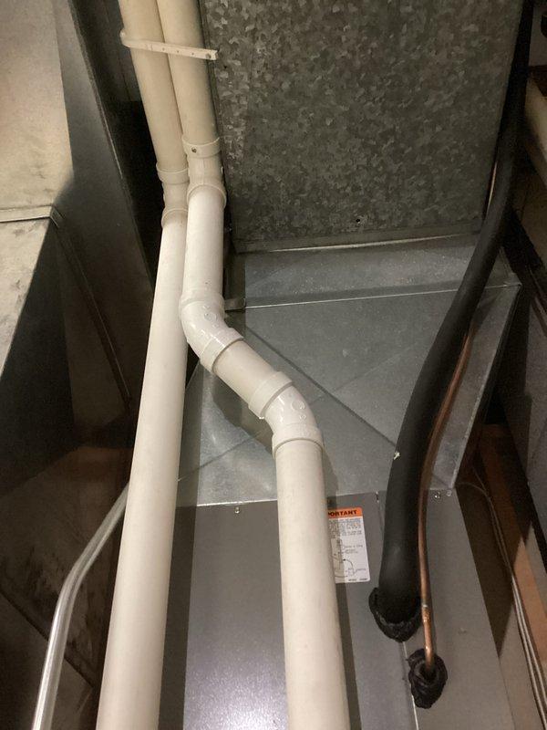 Performed routine seasonal tune-up on HVAC system. Inspected and verified proper leveling of condensate drain lines and equipment using precision level. No issues were found with the PVC drainage assembly or copper refrigerant piping connections during the visual assessment.