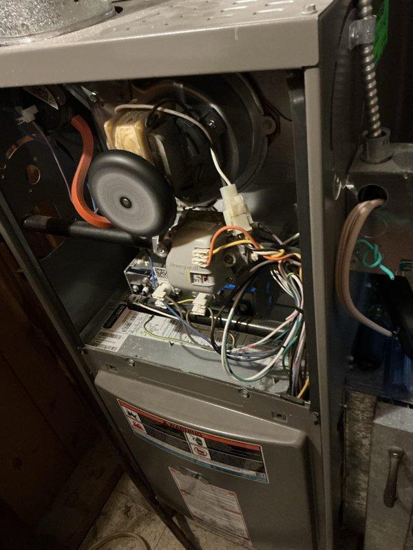 Performed routine inspection and maintenance on Lennox furnace. Opened access panel to inspect blower assembly, electrical connections, and control board; all components in working order. Verified proper operation of motor and electrical systems with no issues detected.