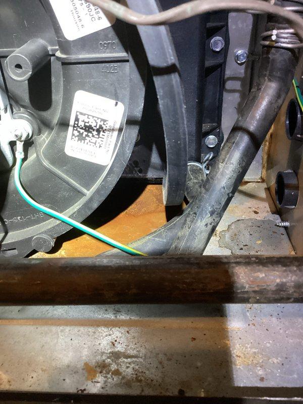 Performed annual maintenance agreement service on residential HVAC furnace system. Inspected interior components including blower motor, electrical control boards, and wiring connections. Observed signs of corrosion on metal housing base that may require monitoring at next scheduled maintenance.