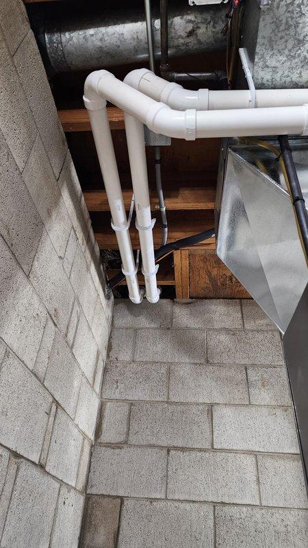 Completed installation of new HVAC system in client's utility space, including proper mounting of ductwork and installation of PVC condensate drainage pipes with appropriate elbow joints and wall brackets. Addressed existing condensation issues on metal panels by installing proper insulation and implementing moisture mitigation measures to prevent future condensation problems.