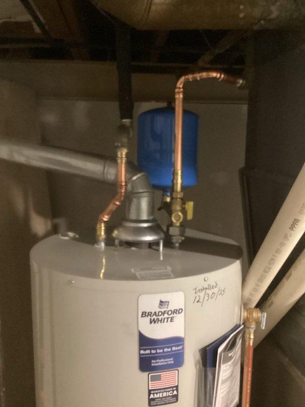 Performed diagnostic inspection on Bradford White tank water heater installed on 12/20/16. Verified proper operation of expansion tank and checked all copper and galvanized pipe connections at the top of the unit. Confirmed system pressure and temperature settings were within manufacturer specifications. No leaks or abnormalities detected in the plumbing configuration.