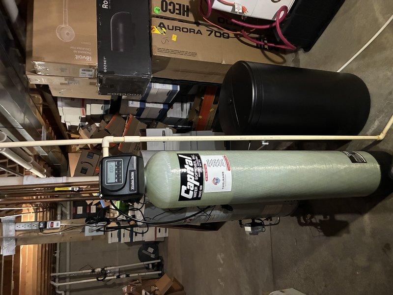 Performed comprehensive kitchen plumbing service addressing debris accumulation in left basin of double-sink system. Conducted thorough inspection and maintenance of existing carbon water filtration system, ensuring proper function of control panel and associated PVC piping connections. Both systems now operating at optimal performance levels.