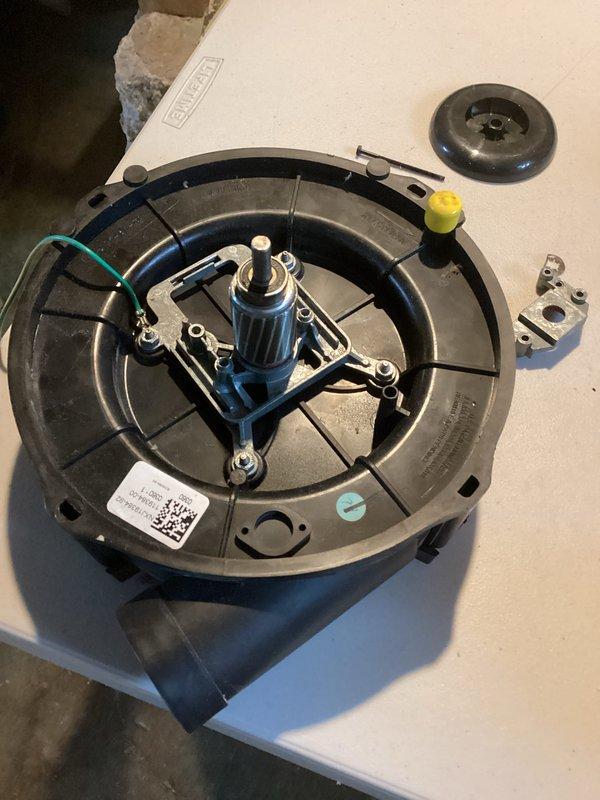 Responded to no-heat complaint for aging system (10+ years old). Diagnosed faulty blower motor after examining heat exchanger and burner assembly. Removed failed blower motor assembly, installed new replacement motor and verified proper system operation. System now heating correctly with all components functioning within specifications.