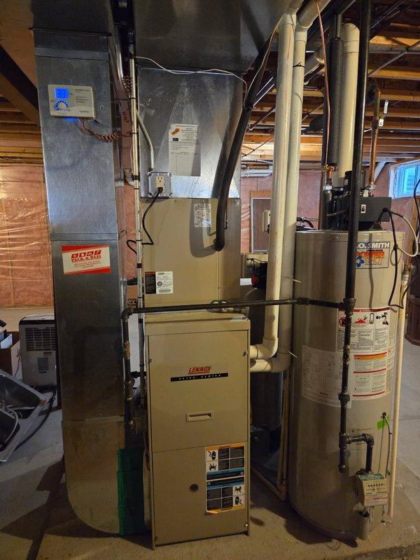 Responded to no-heat complaint on aging Lennox furnace system in basement mechanical room. Diagnostic inspection revealed failed control board with visible heat damage and deteriorating wire connections. Installed new OEM replacement board, secured proper wire connections, and verified operation through complete heating cycle testing. System restored to full functionality with heat output at manufacturer specifications.