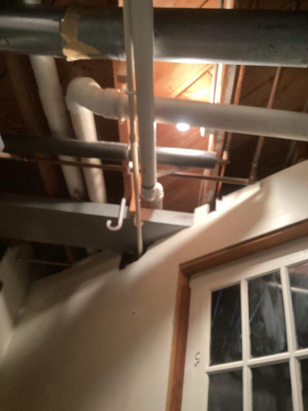 Performed routine tune-up inspection of the HVAC system, examining ductwork, plumbing connections, and air handler unit in the mechanical room. Inspected galvanized sheet metal ducts, PVC pipe connections, and copper piping for proper installation and functionality. All components were found to be in good working order with no visible damage or leaks detected.