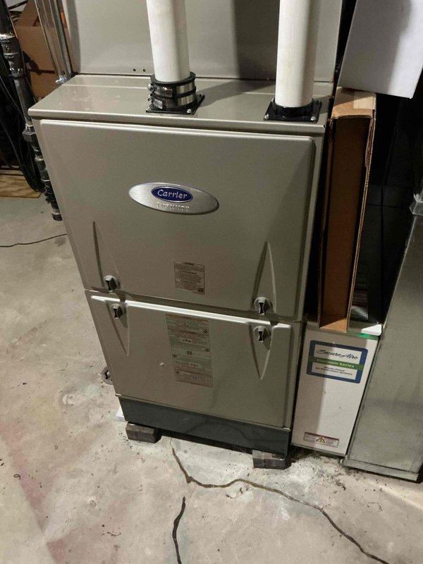Performed scheduled HVAC tune-up on Carrier furnace system. Inspected all components and verified proper system operation, with supply air temperature measuring 129°F, which is within optimal range. No deficiencies were identified during the maintenance service.