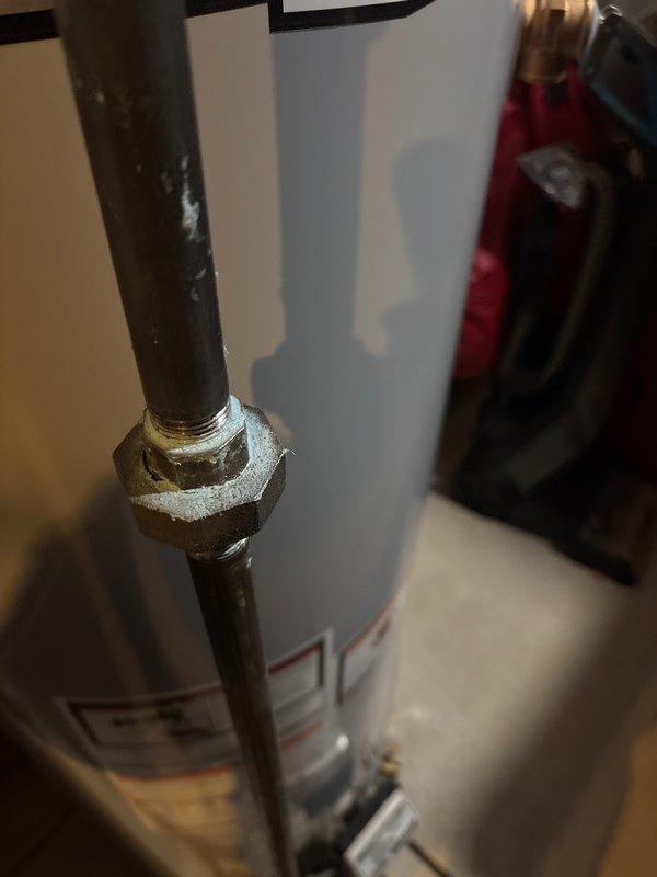 Performed gas line inspection and pressure test on a water heater installation. Located and tightened loose hex union connection on the gas supply pipe, which was causing a leak. Confirmed system integrity with final pressure test showing no further leaks in the gas line.