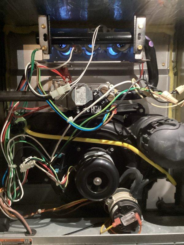 Responded to a no-heat call for an aging furnace (10+ years). Diagnostic inspection revealed flame sensing issues and worn ignition components evident in the control assembly. Replaced faulty flame sensor and cleaned ignition assembly to restore proper heat function. System now operating within normal parameters.