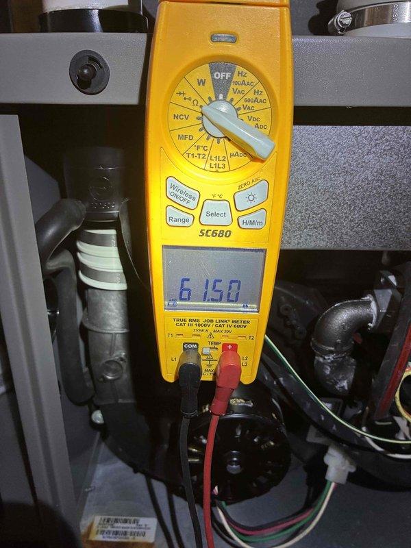 Conducted comprehensive tune-up service on HVAC system including electrical testing with SC680 multimeter which recorded 6.150V during operation. Inspected and adjusted mechanical control components for optimal functionality. System now operating within manufacturer specifications.