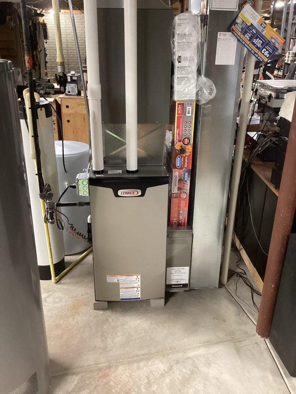 Completed installation of a Lennox furnace unit in basement utility room, including proper connection of intake/exhaust PVC piping and integration with existing ductwork. Performed electrical connections on the control board with appropriate wiring to terminals, ensuring system functionality and adherence to manufacturer specifications.