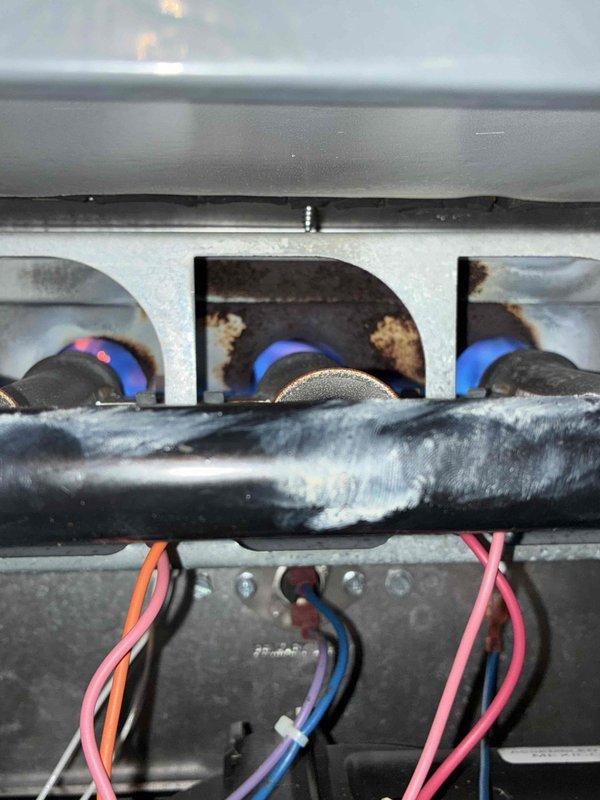Responded to no-heat service call for furnace less than 10 years old. Upon inspection, determined burners were functioning properly with good blue flame pattern indicating appropriate gas combustion. Verified all electrical connections were secure and operational. No further issues identified; system now operating within normal parameters.
