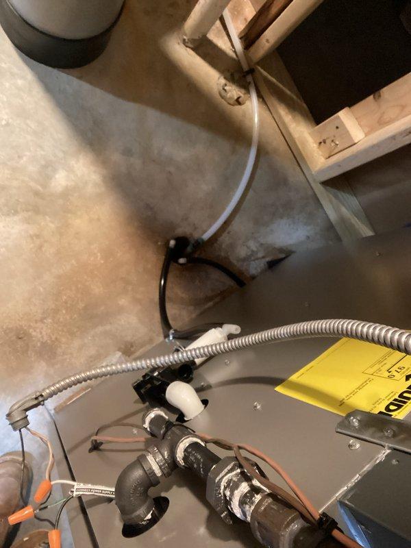 Successfully installed a new high-efficiency furnace in the utility room with properly connected PVC venting system. Ensured all connections to existing mechanical systems were properly secured, including gas line and electrical components. Unit was tested for proper operation with the EnergyGuide label affixed to confirm efficiency ratings.