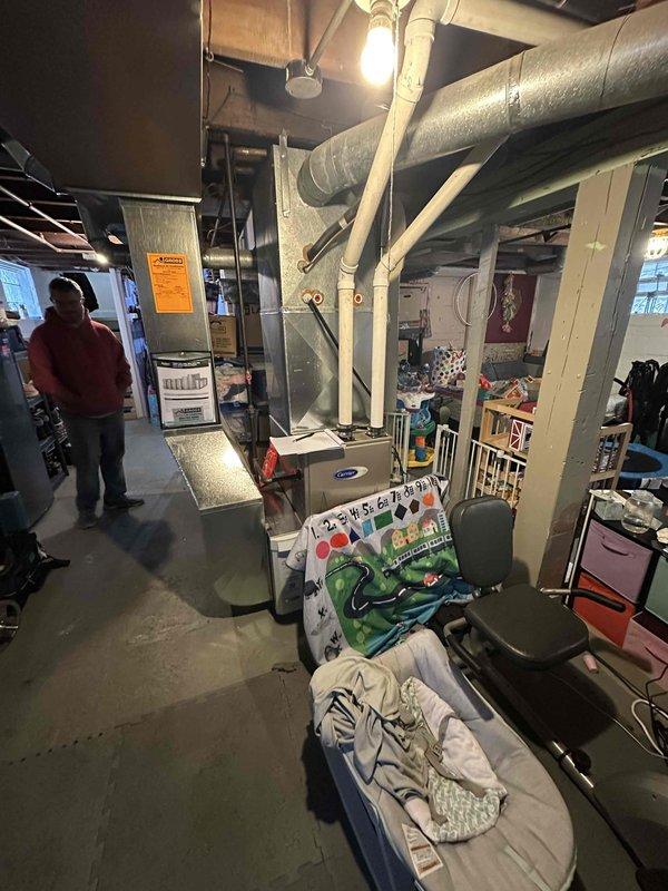 Conducted a thorough assessment of the existing electrical panel and HVAC system for mini-split installation feasibility. Documented the panel's capacity and current breaker configuration to determine appropriate electrical requirements for the proposed mini-split system. Evaluated basement utility area for optimal condensate line routing and potential mounting locations for indoor air handler and outdoor condenser unit.