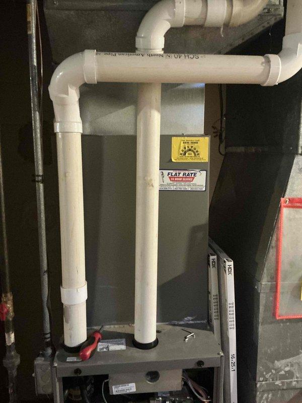 Performed comprehensive inspection of existing furnace system, revealing aging components including deteriorating circuit board, worn motor assembly, and compromised gas valve. Recommended full HVAC replacement with new high-efficiency unit, including installation of proper PVC venting configuration with appropriate angles and clearances for optimal airflow and condensate management. Installed new filtration system to ensure improved air quality and system longevity.