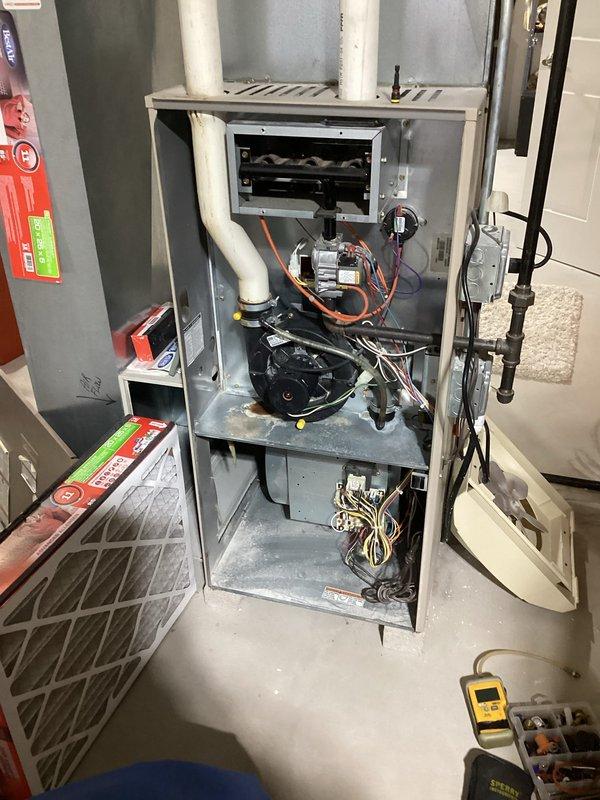 Completed routine tune-up on residential gas furnace system. Conducted comprehensive combustion analysis using Testo 310 analyzer, verifying proper operation with readings showing 86.7% efficiency, 12.4% O₂, and 9 ppm CO levels within acceptable parameters. Inspected internal components including blower assembly, control boards, and venting system; replaced air filter to maintain optimal system performance.