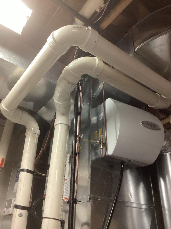 Completed routine maintenance on Armstrong Air furnace system. Inspected PVC intake and exhaust venting components, checked connections to ductwork, and confirmed proper installation of the unit. All systems operating within normal parameters with no issues detected.