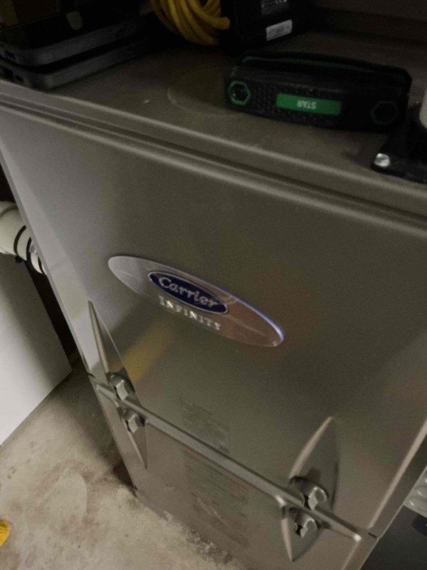 Performed comprehensive tune-up on Carrier Infinity HVAC system including inspection of ductwork integrity. Used diagnostic equipment (ST43) to verify system performance and functionality. Interior duct inspection revealed normal condition with no significant debris or damage observed.