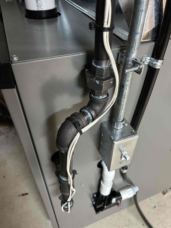Successfully installed a high-efficiency furnace with proper ductwork connections in the client's utility room. Completed all necessary plumbing and electrical connections, ensuring proper insulation of black piping and secure mounting of junction box. System was tested and is functioning optimally with appropriate airflow.