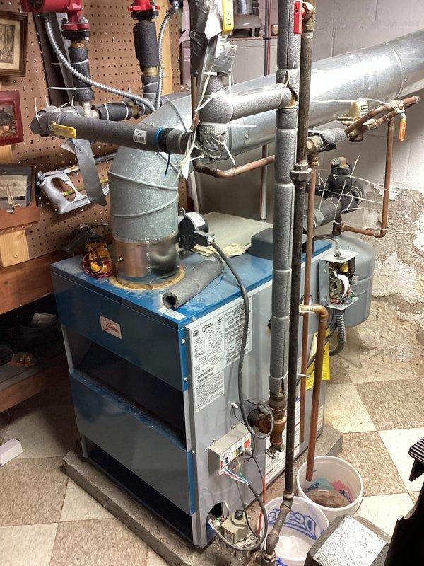 Diagnosed and serviced a 10+ year old heating system exhibiting no-heat condition. Identified faulty circulation pumps on the hydronic heating system and replaced both red pumps with new units, ensuring proper electrical connections and testing system functionality. System now operating at optimal performance with restored heat output.