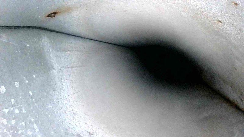 Performed comprehensive tune-up inspection on HVAC system. Identified mold growth in condensate drain line and significant deterioration of duct insulation. Cleaned drain line, applied antimicrobial treatment, and documented insulation condition for future replacement recommendation.