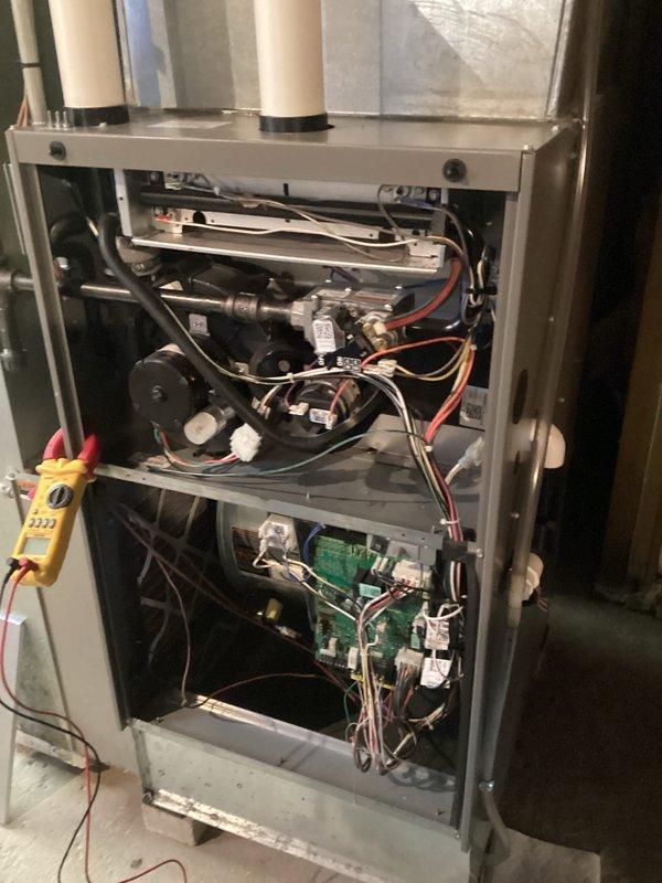 Performed comprehensive HVAC tune-up including inspection of internal components and electrical connections. Conducted full combustion analysis using Testo 310 II analyzer, which revealed proper combustion efficiency at 92.7% with CO2 at 6.39% and minimal CO levels (7 ppm). System is operating within manufacturer specifications with all safety controls functioning correctly.