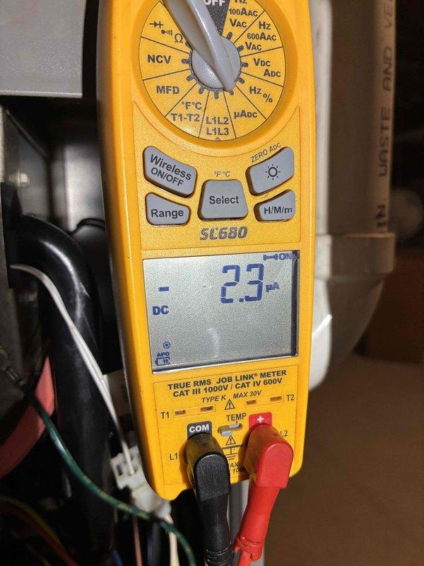 Performed routine maintenance tune-up on HVAC system. Conducted electrical measurements using Fieldpiece SC680 multimeter, verifying DC voltage at 2.3V. Checked system temperature with PDT659 thermometer, confirming operating temperature of 100.9°F, which is within normal parameters.