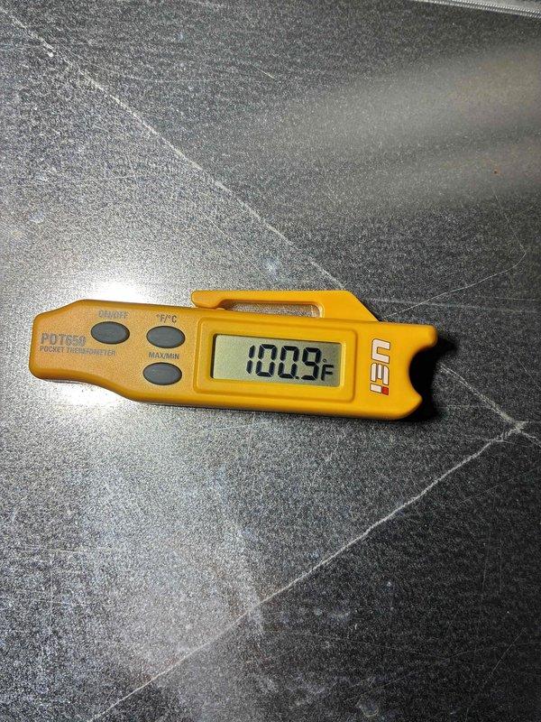 Performed routine maintenance tune-up on HVAC system. Conducted electrical measurements using Fieldpiece SC680 multimeter, verifying DC voltage at 2.3V. Checked system temperature with PDT659 thermometer, confirming operating temperature of 100.9°F, which is within normal parameters.