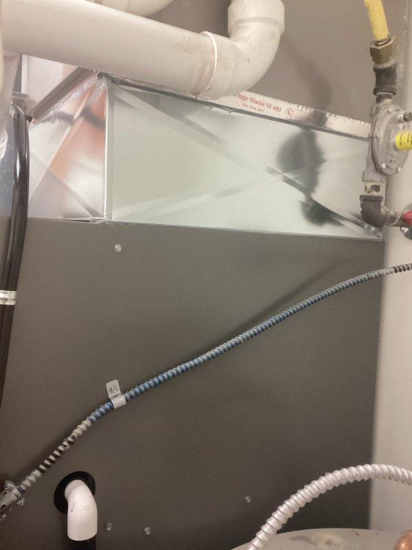 Successfully installed a new Lennox furnace in the utility room, complete with proper PVC ventilation system featuring intake and exhaust pipes. Connected the unit to the existing ductwork with appropriate transitions and ensured all electrical connections and condensate drainage were properly configured for optimal performance.