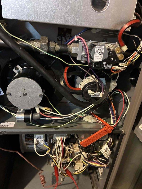 Performed routine tune-up on HVAC system. Inspected main circuit board and electrical connections for proper function and secure wiring. Examined all interior components including motor assemblies, wiring harnesses, and control boards to ensure optimal system operation and safety compliance.