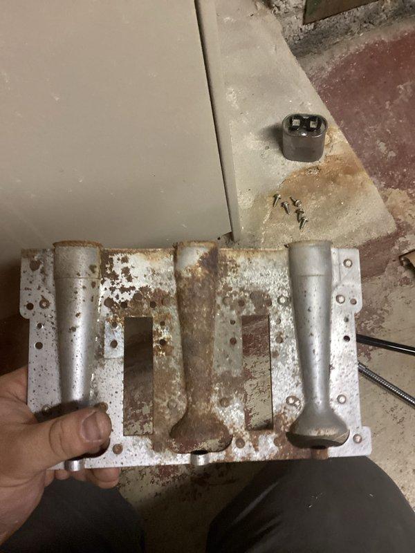 Removed and replaced severely corroded blower motor mounting bracket that exhibited significant rust damage. Inspected and tested the furnace system after installation, confirming proper operation of the blower motor assembly and verifying all electrical connections were secure and functioning correctly.