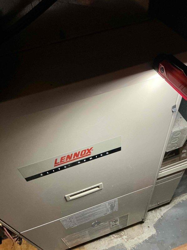 Performed annual preventative maintenance inspection on Lennox Elite Series HVAC system located in basement. Visual inspection revealed system in good working condition with minor dust accumulation. Cleaned and inspected insulation material, which showed no signs of significant wear or damage.