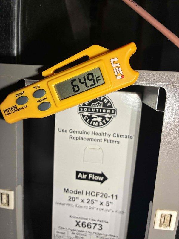 Performed seasonal tune-up on Lennox furnace system. Inspected PVC intake/exhaust venting for proper installation and airflow. Temperature tested system operation with readings at 64.9°F, indicating normal function. Replaced air filter with new Healthy Climate HCF20-11 (20"x25"x5") filter to ensure optimal air quality and system efficiency.