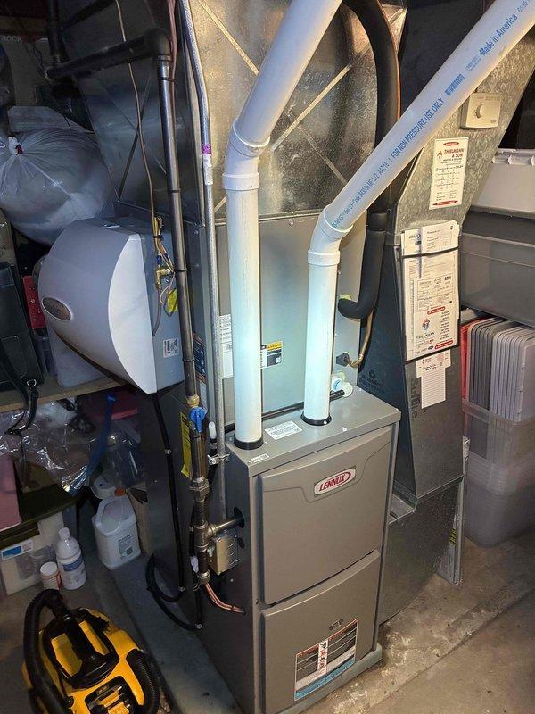 Completed standard tune-up maintenance on Lennox furnace system. Inspected and cleaned the clean-out component and related connections. Examined humidifier and associated ductwork, confirming proper installation and function of all PVC exhaust/intake venting. System is operating within normal parameters.