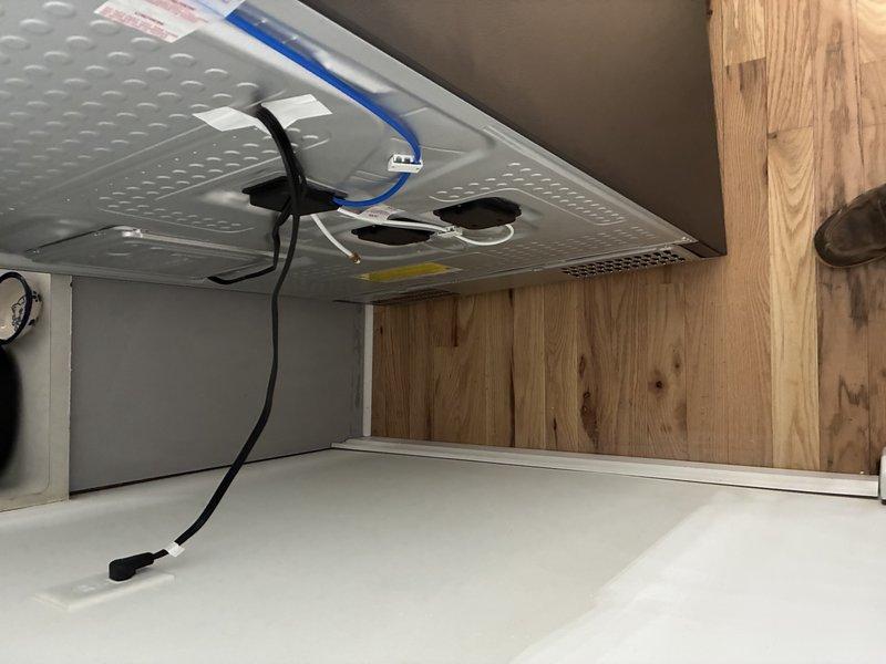 Conducted thorough inspection of under-sink plumbing and attic water supply infrastructure. Identified copper pipe connection issues in the attic crawl space with compromised joint fitting. Documented system components and insulation condition with comprehensive photos to support estimate for fixture replacement.