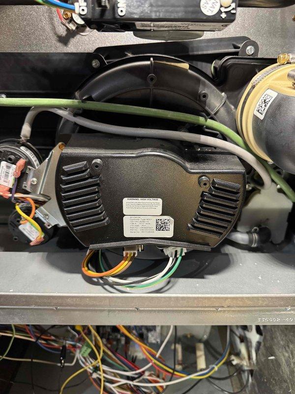 Responded to no-heat service call for Carrier Infinity furnace. Diagnosed failed ECM blower motor based on visual inspection and component testing. Replaced defective motor, recalibrated system, and verified proper operation through complete heating cycle test. Unit now functioning normally with restored airflow.