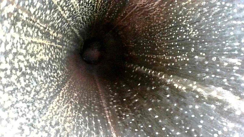 Conducted routine HVAC maintenance inspection and identified condensation issues within the ductwork. Observed significant moisture accumulation on interior duct surfaces with evidence of potential mold growth beginning to form on the dark surfaces. Cleaned affected areas and addressed condensation source to prevent recurrence.