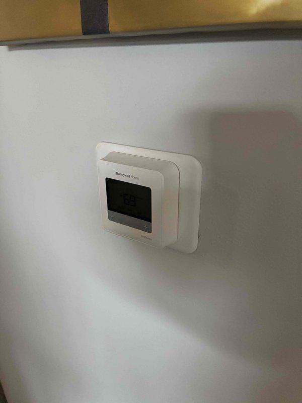 Performed routine maintenance on HVAC system including inspection of copper heat exchange coils with finned tubing. Verified proper operation of the Honeywell digital thermostat which was correctly maintaining temperature at 68°F. System appears to be functioning within normal parameters.