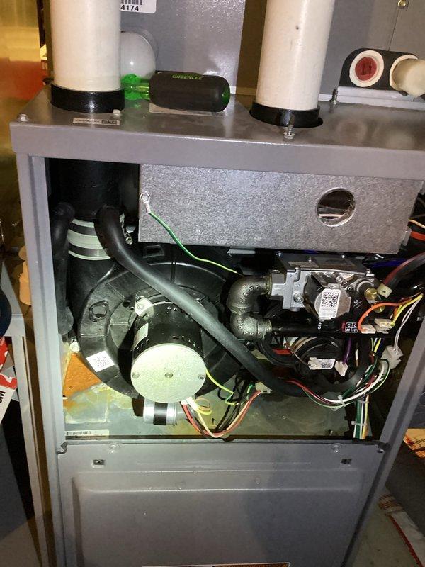 Performed comprehensive inspection of HVAC unit showing significant internal corrosion on metal chassis and components. Replaced rusted pipe fittings and elbow joints that were causing moisture accumulation. Cleaned corroded surfaces and verified proper operation of motor assembly, control module, and wiring connections to restore system functionality.