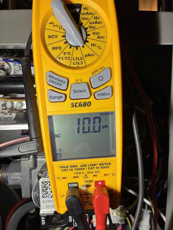 Performed routine tune-up on Lennox heating system, conducting comprehensive inspection of all components. Tested microamp current draw with Fieldpiece SC680 multimeter, confirming proper flame rectification at 10.0 μA which is within manufacturer specifications. Visual inspection of furnace installation, venting, and connections showed system in good working condition with no immediate concerns.