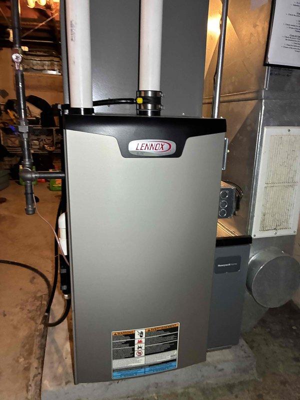 Performed routine tune-up on Lennox heating system, conducting comprehensive inspection of all components. Tested microamp current draw with Fieldpiece SC680 multimeter, confirming proper flame rectification at 10.0 μA which is within manufacturer specifications. Visual inspection of furnace installation, venting, and connections showed system in good working condition with no immediate concerns.