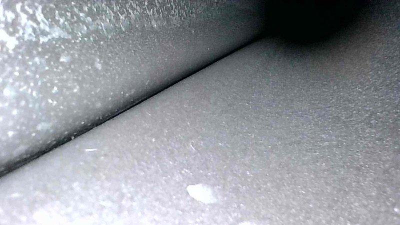 Performed routine HVAC tune-up inspection, examining insulation condition and ductwork integrity. Observed standard wear on insulation materials and inspected interior metal ductwork for proper sealing and airflow. No significant issues detected; system operating within normal parameters.